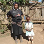 Mary and her mother are experiencing the health benefits of improved hand washing at school and home thanks to a WASHplus workshop at her ECD.